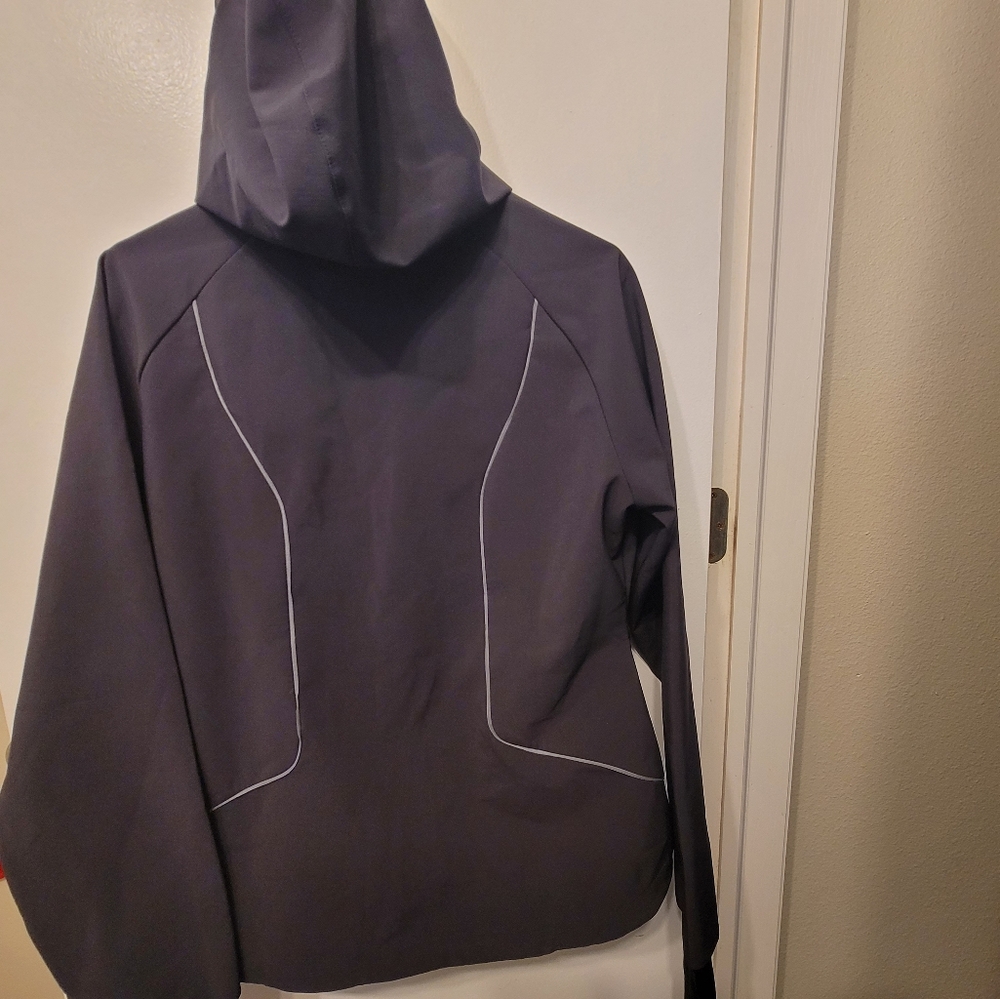 Under Armour women's sideline storm woven jacket.